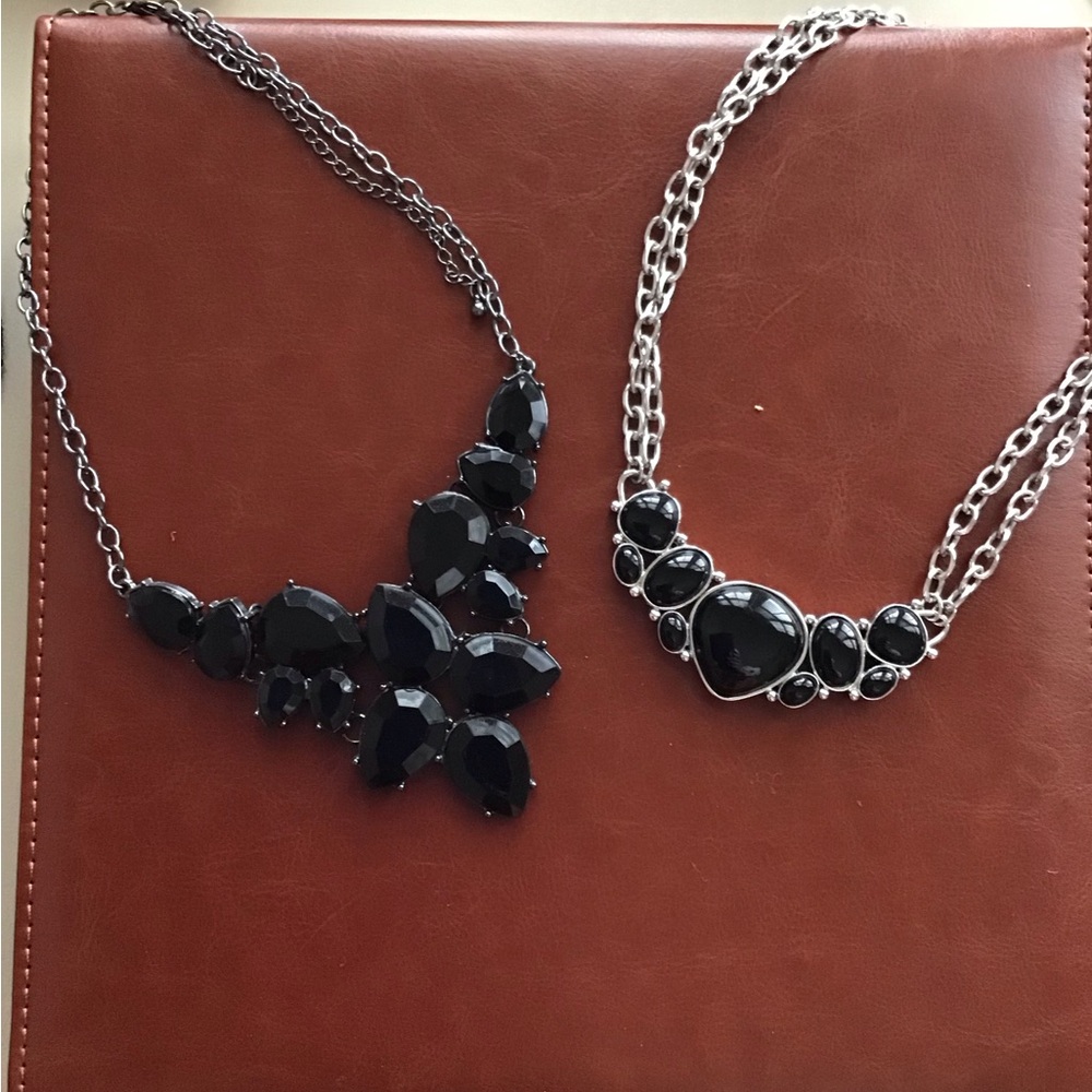 2 black statement necklaces